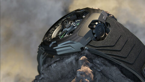 A futuristic wristwatch with intricate mechanical design and a robust casing, resting on a rugged surface with a misty background, conveying a sense of adventure and advanced technology.