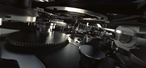 Machines complexes au travail : vue rapprochée d'engrenages et de rouages industriels nichés dans un appareil complexe, suggérant un système d'opérations mécaniques sophistiquées.