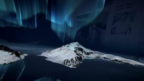Aurora borealis illuminating the sky above snow-capped mountains.
